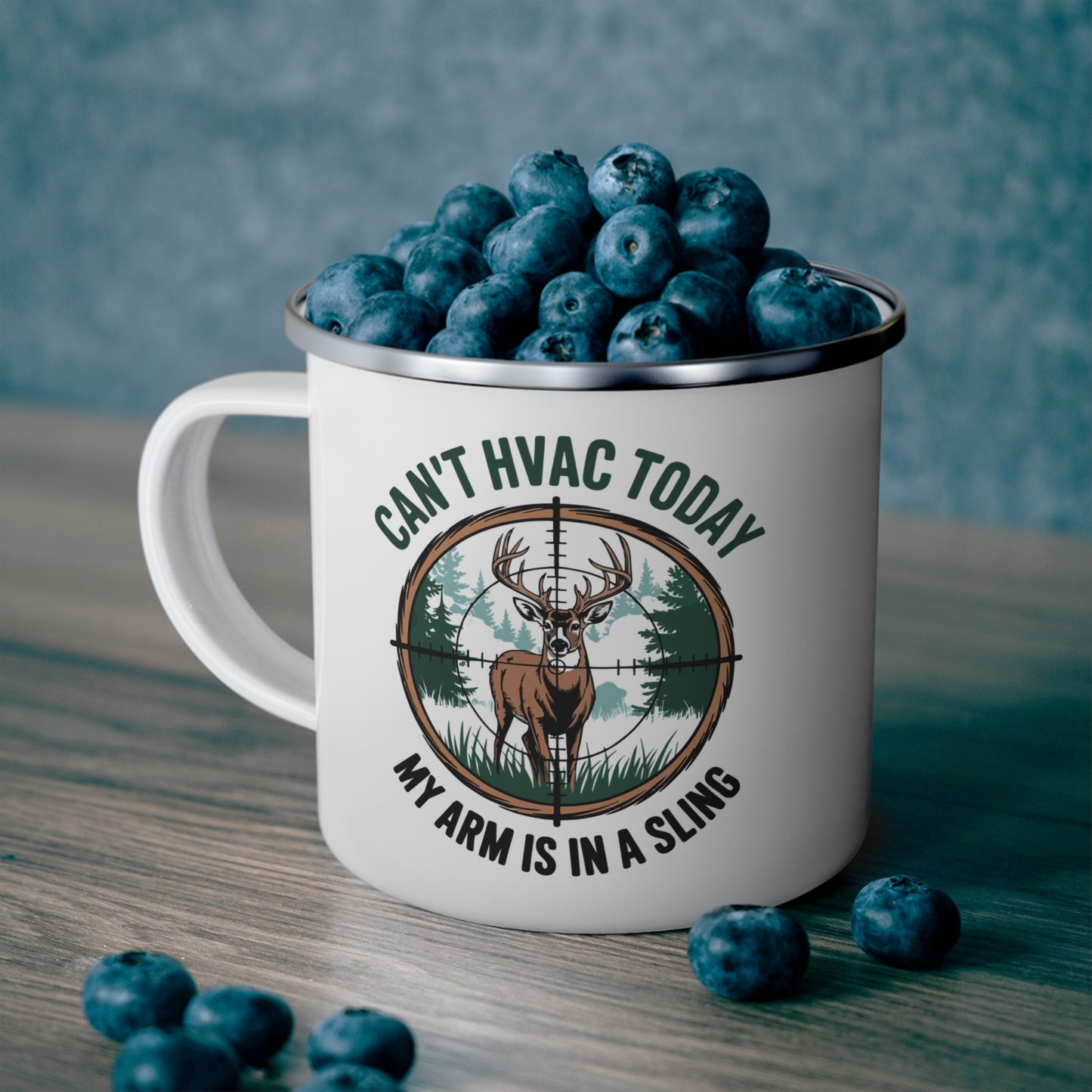 Mug with blueberries and humorous HVAC inspired hunting graphic on a wooden surface