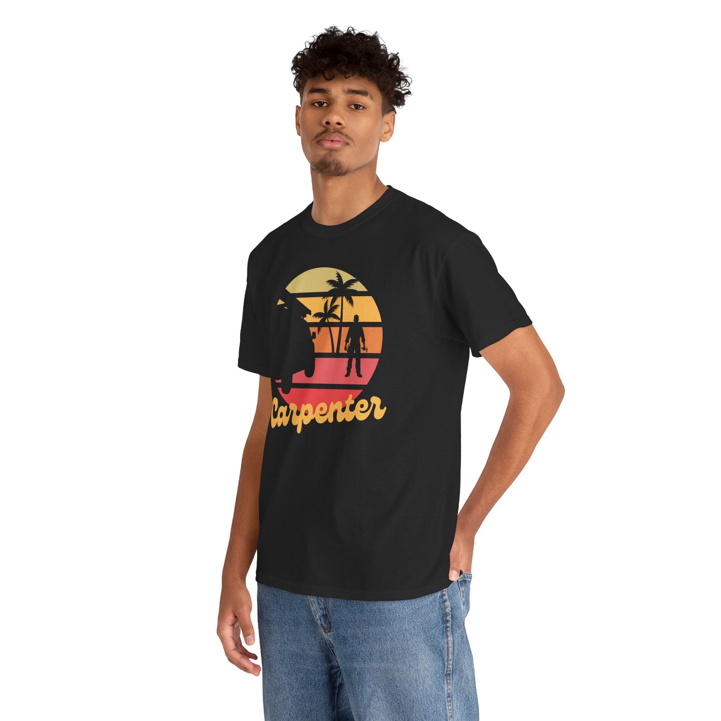 Man wearing a black t-shirt with a 'Carpenter' graphic design featuring palm trees and a sunset.