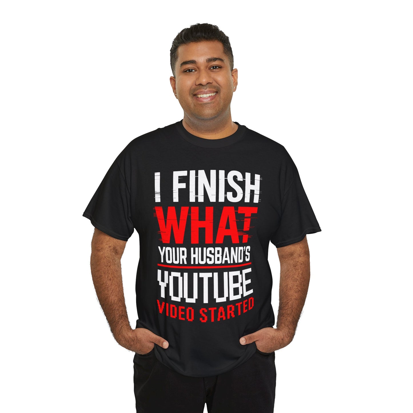 Man wearing a black t-shirt with humorous text design on a white background