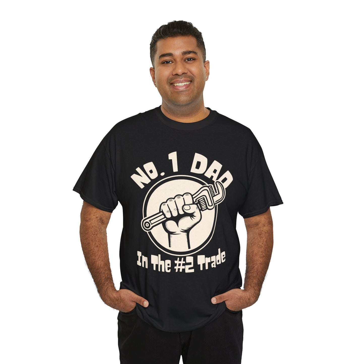 Man wearing a black plumbing dad t-shirt with a graphic and text, standing against a white background