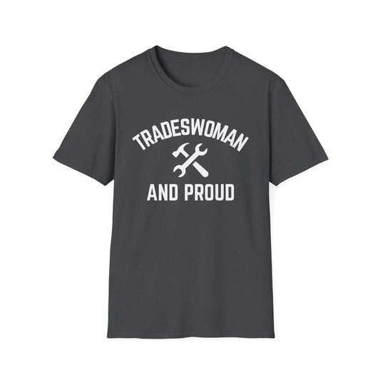 Dark gray t-shirt with 'Tradeswoman and Proud' text and hammer-wrench graphic on a white background