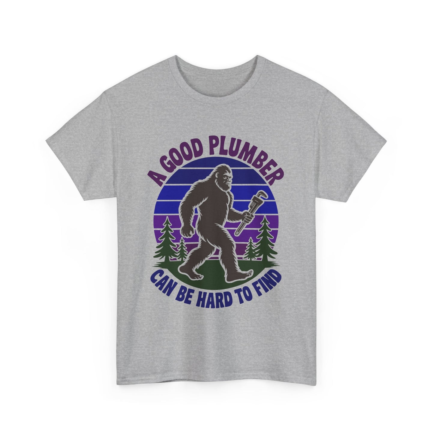 Gray t-shirt with a graphic of a bigfoot-like creature holding a wrench and text 'A Good Plumber Can Be Hard to Find' on a white background.