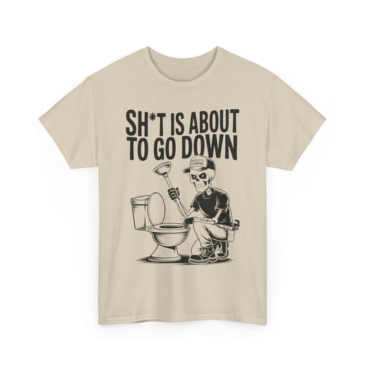 Beige t-shirt with skeleton graphic and text on a white background
