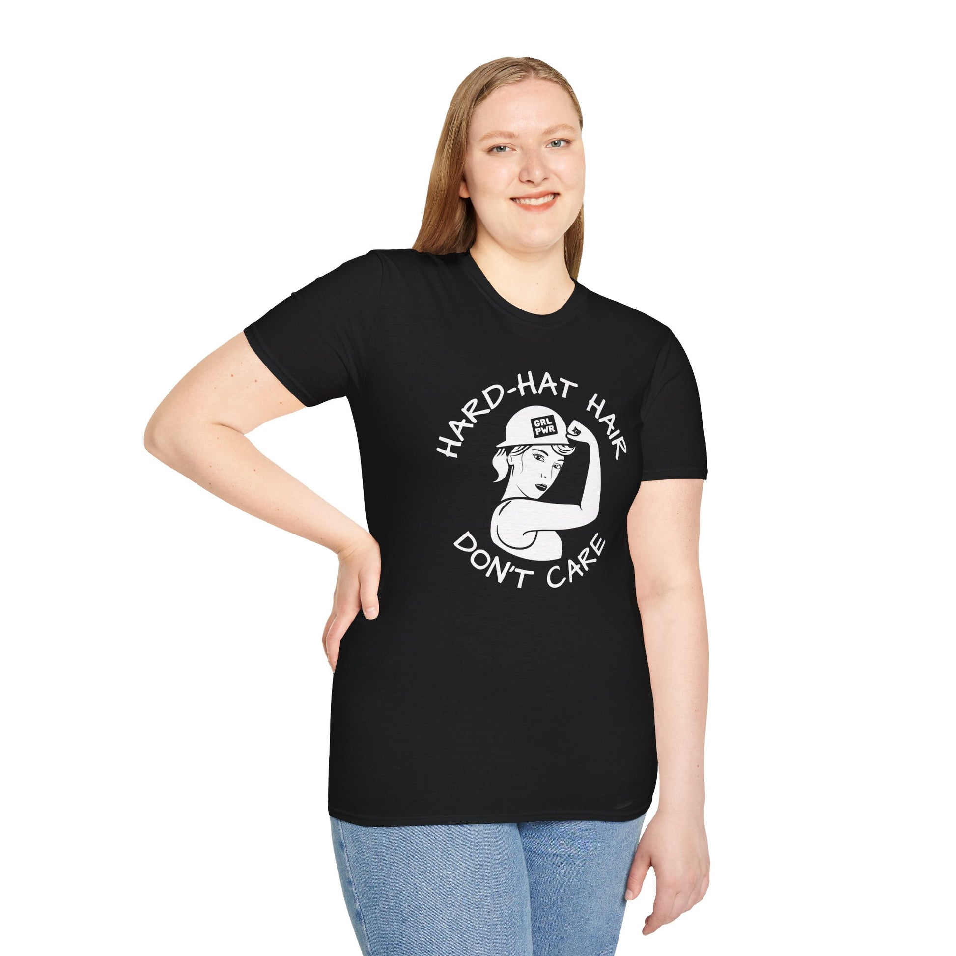 Woman wearing a black t-shirt with white graphic and text 'Hard-Hat Hair Don't Care'