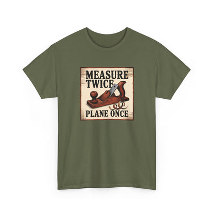 Green t-shirt with a wooden sign graphic and text 'Measure Twice, Plane Once' on a white background