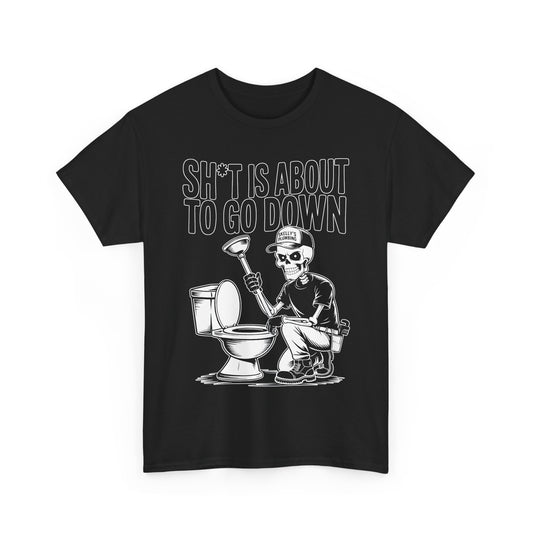 Black t-shirt with a graphic of a skeleton using a plunger and text 'Sh*t is about to go down' on a white background.