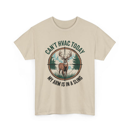 Beige t-shirt with a graphic of a deer and text 'Can't HVAC Today, My Arm is in a Sling' on a white background