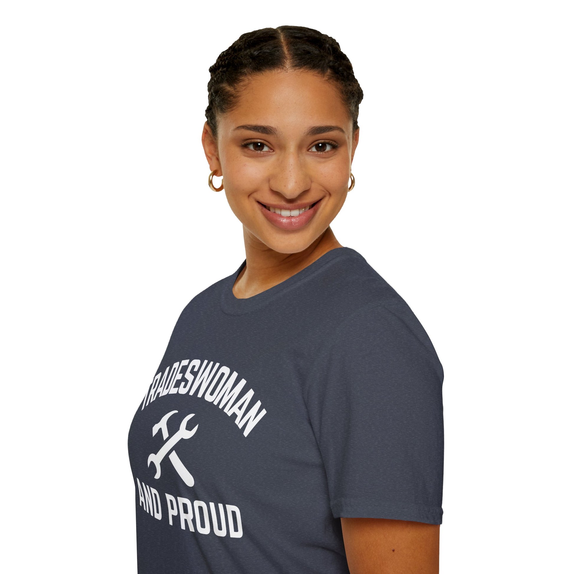Woman wearing a t-shirt with 'Tradeswoman and Proud' text on a white background