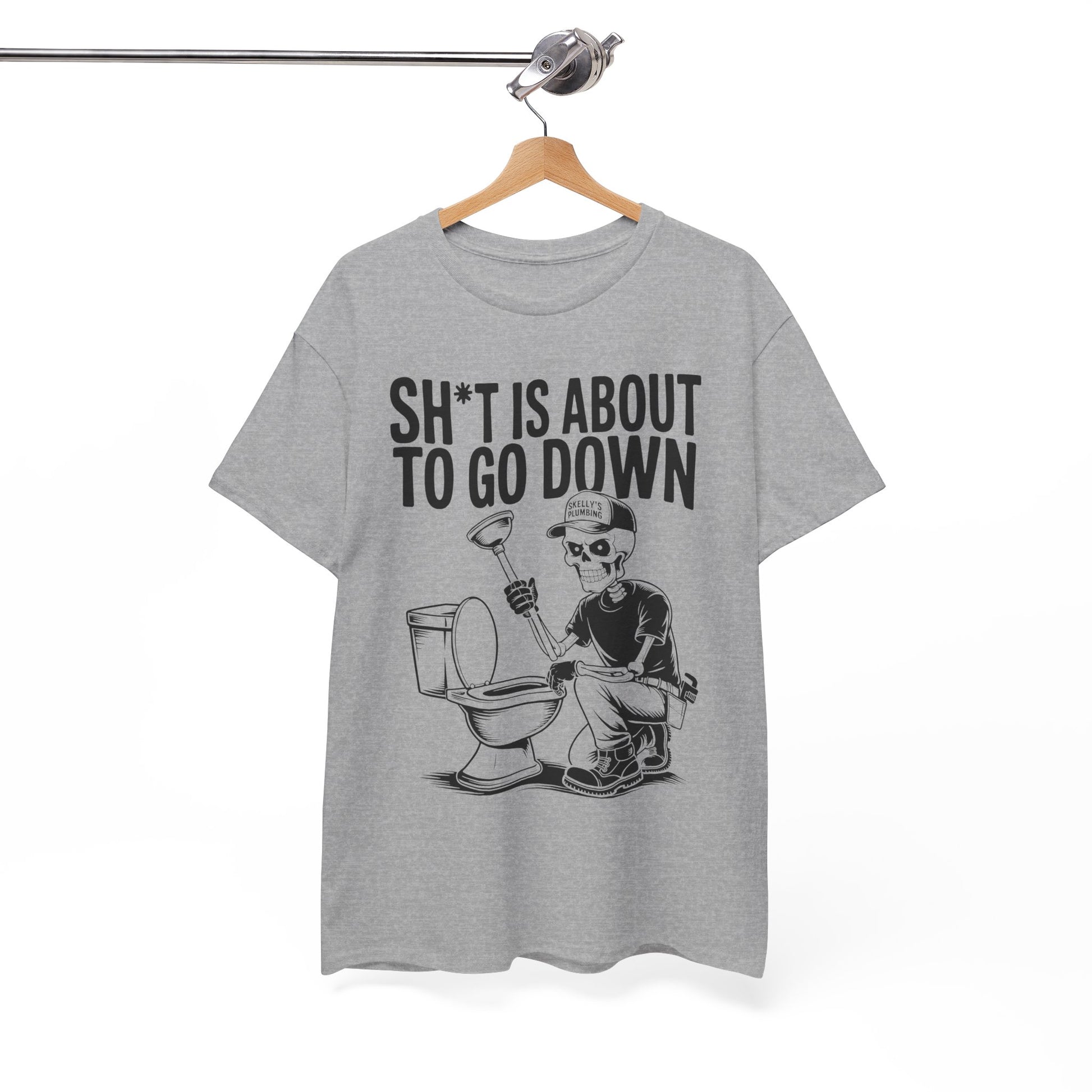 Gray t-shirt with graphic design and text on a hanger against a white background