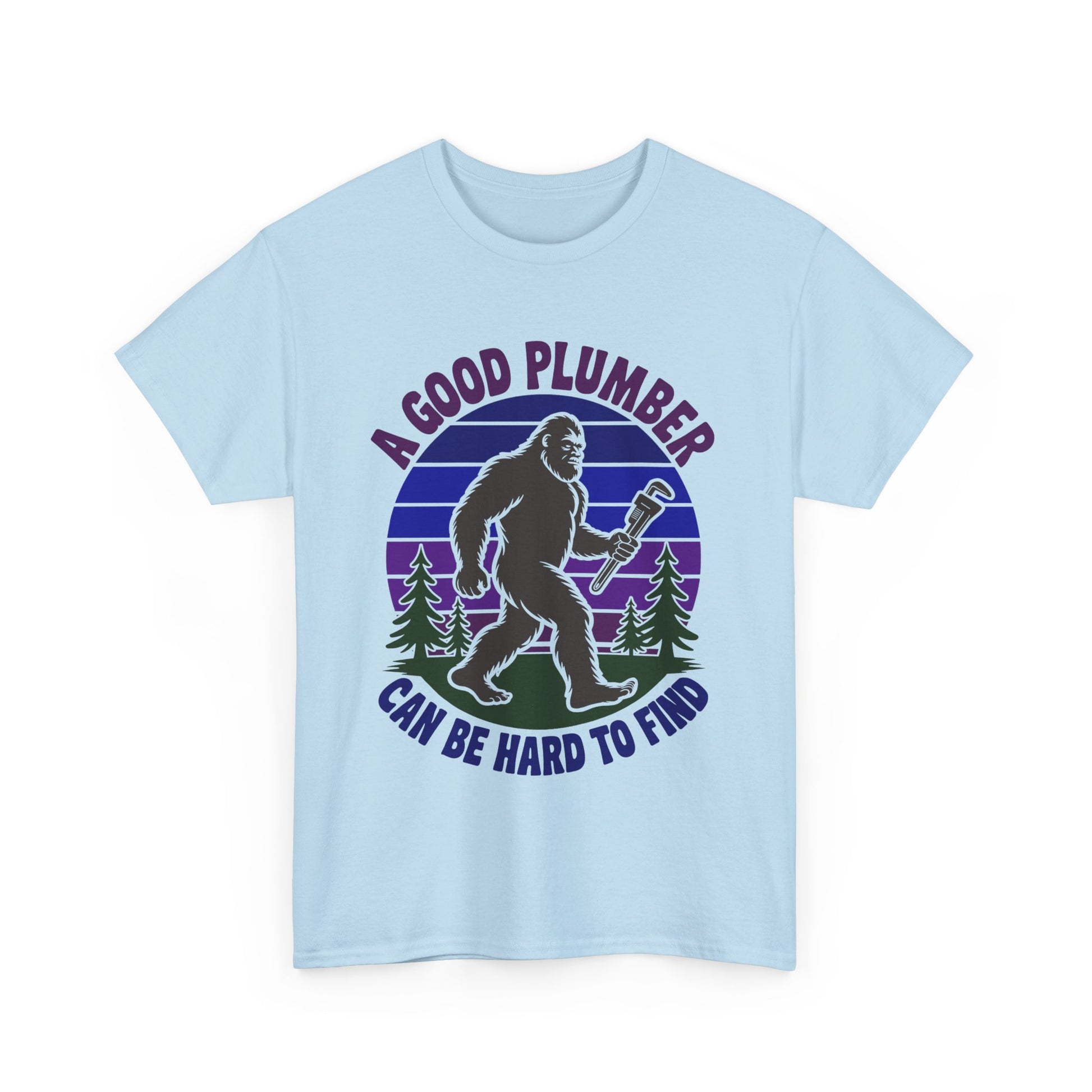 Light Blue t-shirt with a graphic of a bigfoot-like creature holding a wrench and text 'A Good Plumber Can Be Hard to Find' on a white background.