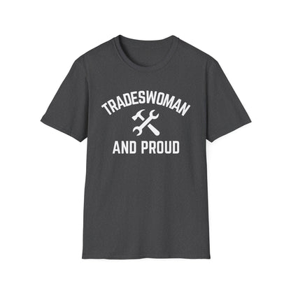 Dark gray t-shirt with 'Tradeswoman and Proud' text and hammer-wrench graphic on a white background