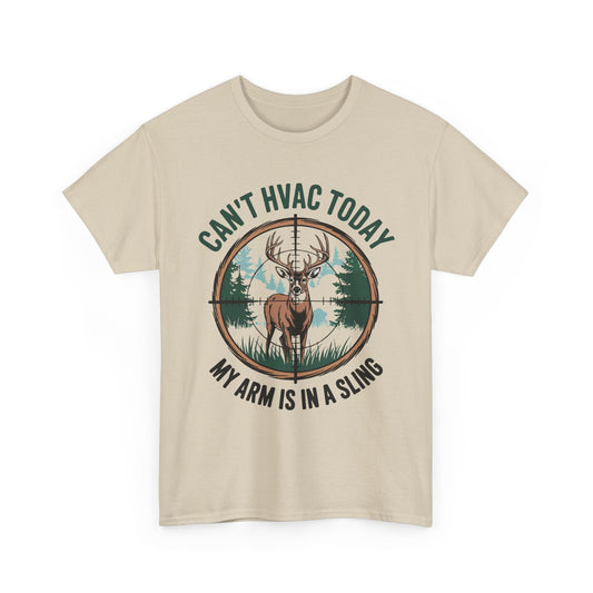 Beige t-shirt with a graphic of a deer and text 'Can't HVAC Today, My Arm is in a Sling' on a white background