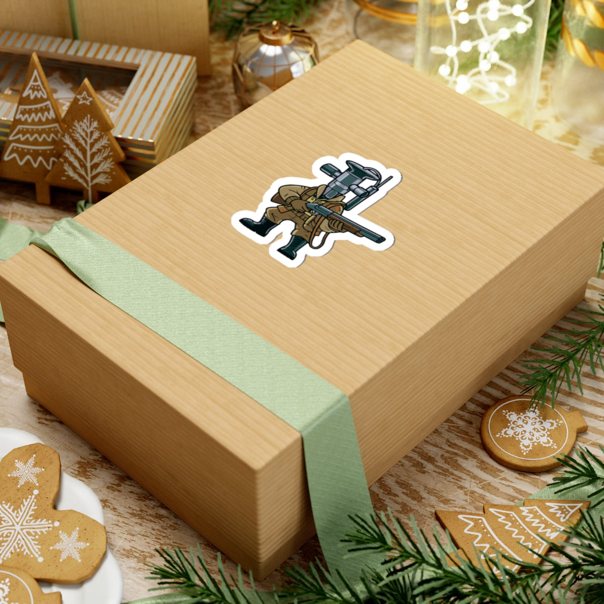 Gift box with a sticker of a Cartoon TXV Valve in hunting gear on a white background